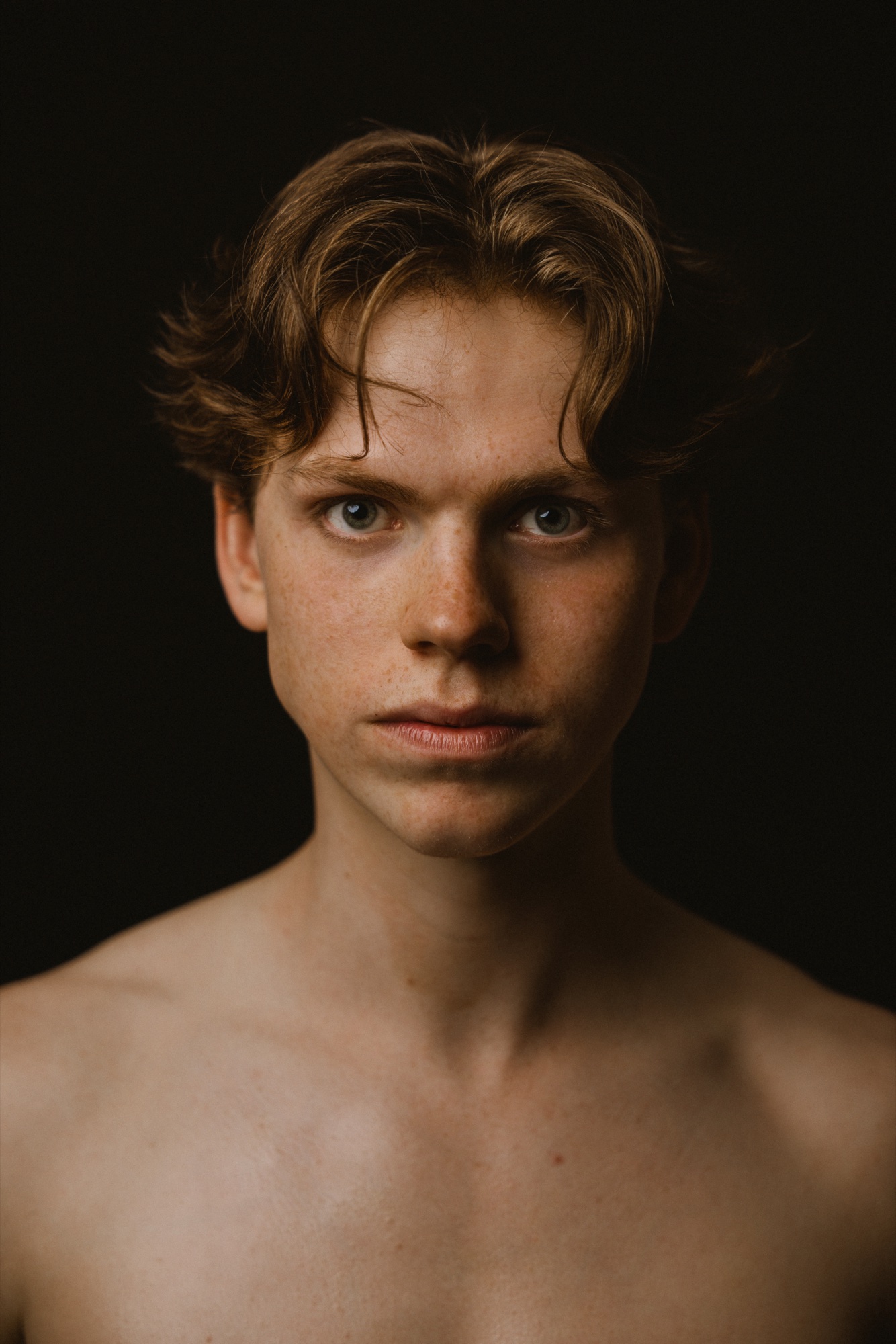 Tight studio headshot of Senne with a direct gaze